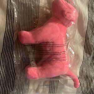 Pink VS stuffed dog